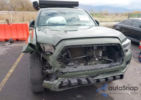 2022 Toyota Tacoma Trd Off Road z USA, uszkodzony, nr VIN 3TYSZ5AN1NT097045